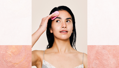 Black hair woman wearing a grey and white bra giving herself a deep cleansing session with a face brush and Gatineau skincare face wash lotion, after her shower. Studio skincare portrait over isolated background.