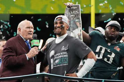 Former NFL quarterback Terry Bradshaw interviews Philadelphia Eagles' quarterback #01 Jalen Hurts at the end of Super Bowl LIX, after the Philadelphia Eagles defeated the Kansas City Chiefs 40-22 at Caesars Superdome in New Orleans, Louisiana, February 9, 2025.