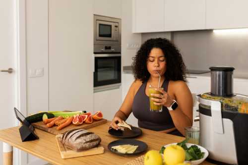 woman enjoying high-protein snacks from walmart in her kitchen