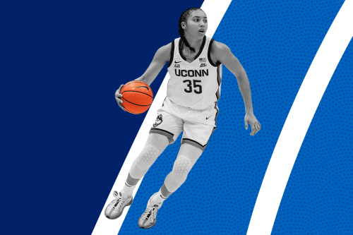 photo of UConn basketball player Azzi Fudd holding a basketball while wearing a #35 jersey