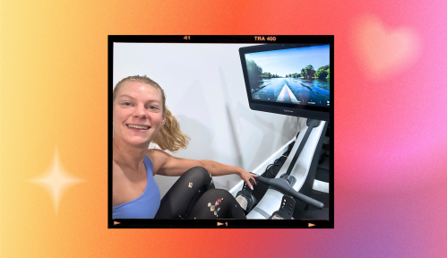 Women smiles and takes a selfie while using the Hydrow Pro Rower rowing machine in her at-home gym.