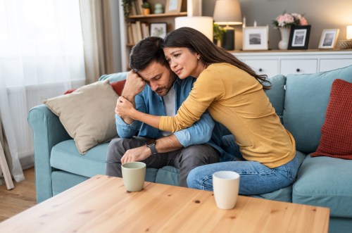Wife expressing empathy and compassion to her frustrated husband