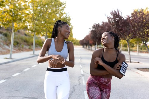 women on a walk in nike running shoes